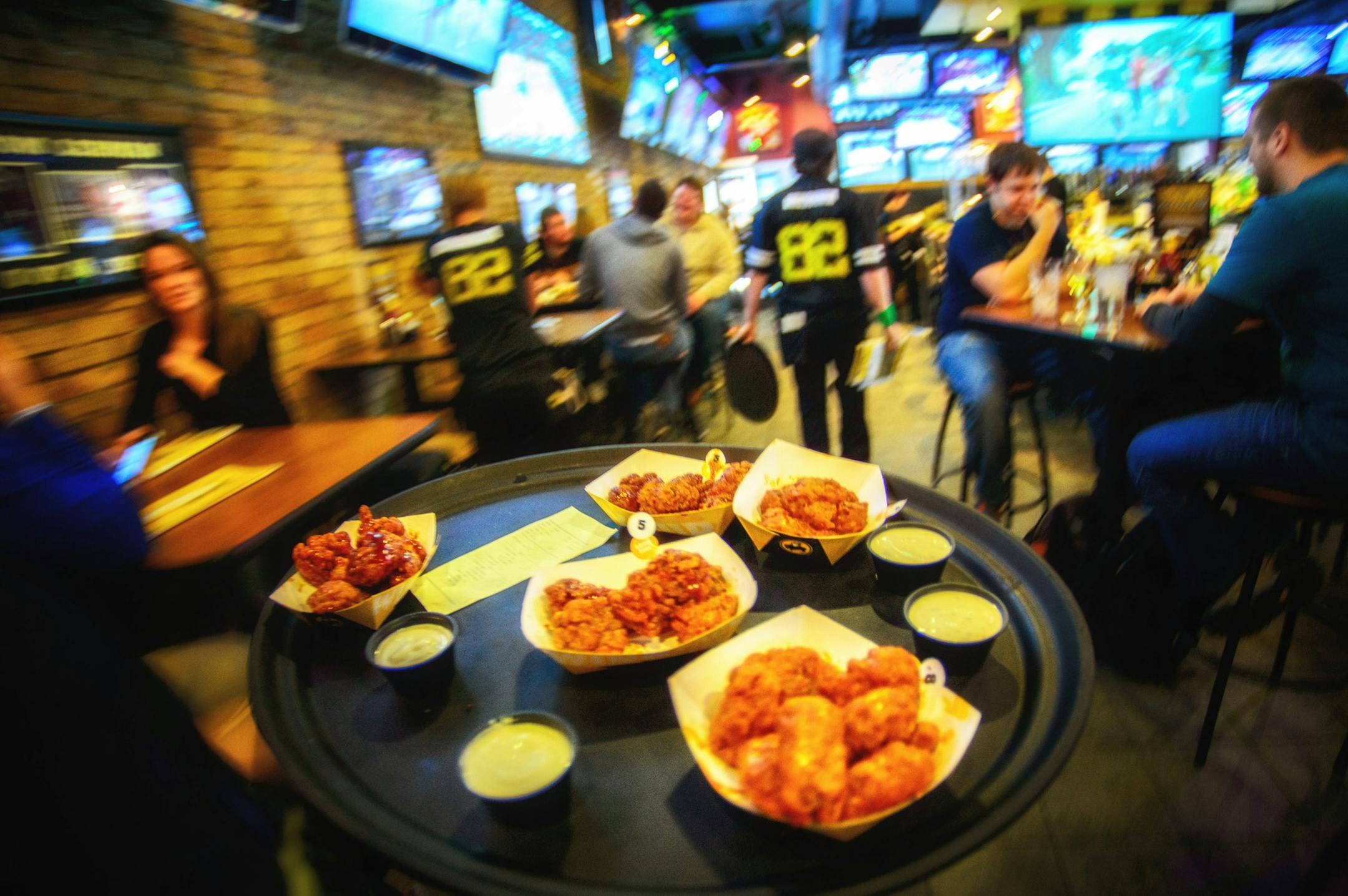 A tray full of the signature item at the Buffalo Wild Wings&#x2019; University of Minnesota location. The company opened its 1,000th restaurant earlier this year and is still expanding.