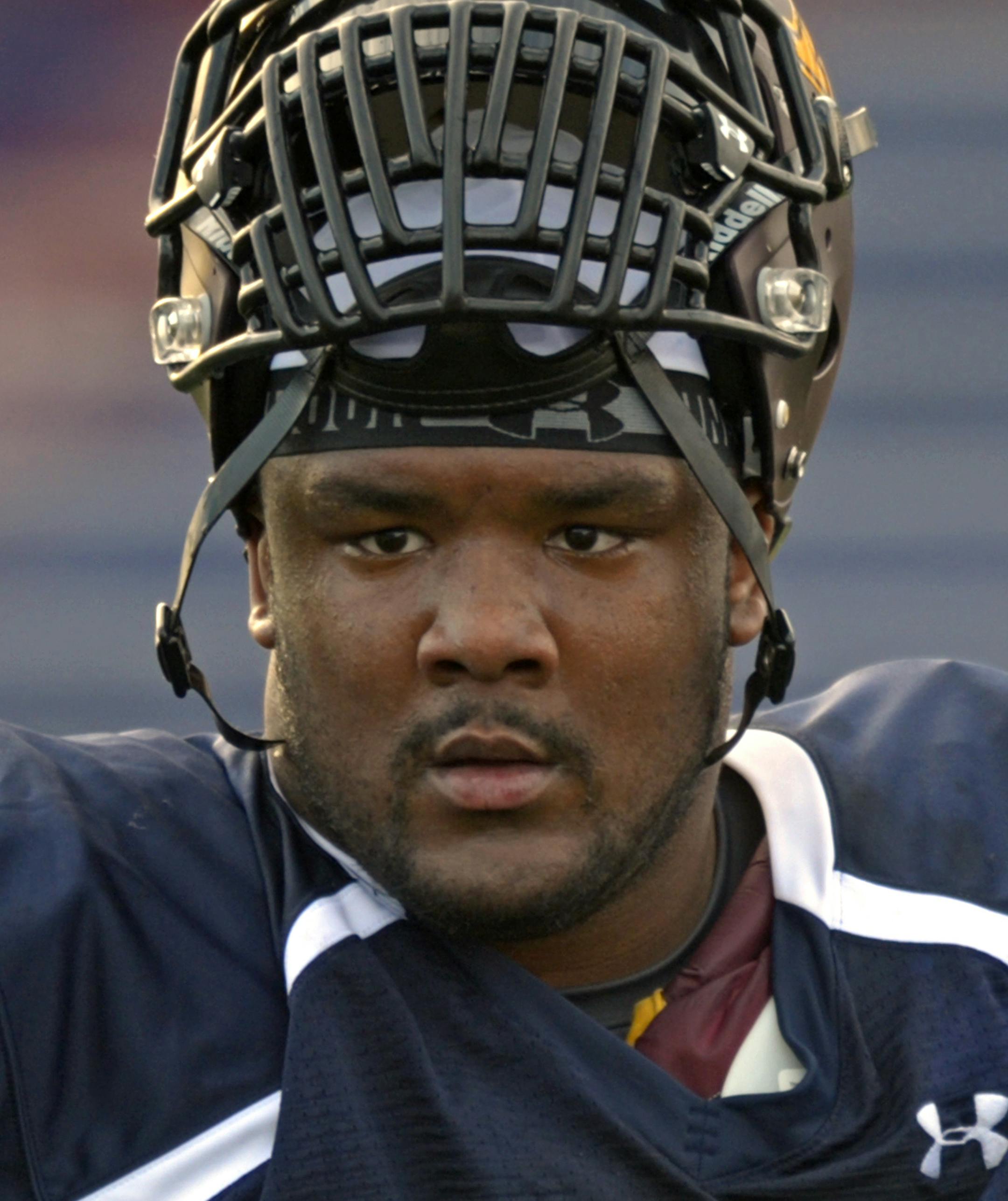 North Squad defensive tackle Ra'Shede Hageman of Minnesota (99) takes a break during Senior Bowl practice at Ladd-Peebles Stadium, Monday, Jan. 20, 2014 in Mobile, Ala. (AP Photo/G.M. Andrews)