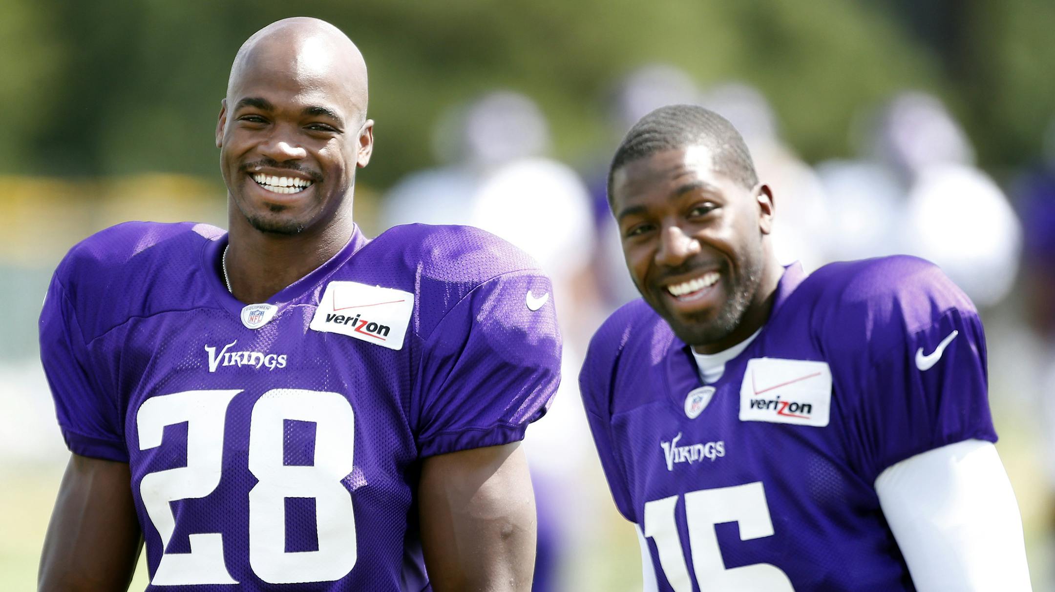 Minnesota Vikings Adrian Peterson (28) and Greg Jennings (15) during the afternoon practice. ] CARLOS GONZALEZ cgonzalez@startribune.com July 29, 2013, Minnesota Vikings Training Camp, Mankato, Minn., Minnesota State University, Mankato - afternoon practice ORG XMIT: MIN1307291757053926
