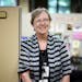 Kathy Heuer is 66 and working for at least 3 more years past the usual retirement age. She works at the Metropolitan Area Agency on Aging in Maplewood