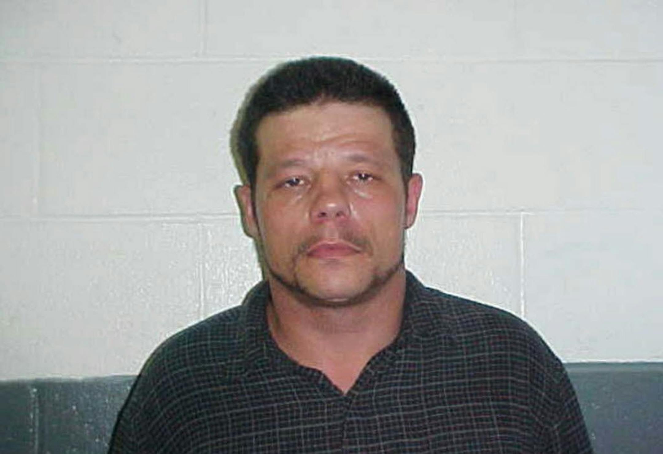 This June 8, 2010 photo provided by the Kay County Detention Center shows Michael Vance. Authorities are searching for Vance, who is suspected in a double slaying and accused of shooting and wounding multiple police officers near Oklahoma City on Sunday, Oct. 23, 2016.