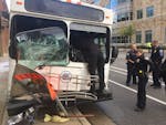 Rescuers respond to a Plymouth Metrolink bus crash in downtown Minneapolis on Wednesday morning.