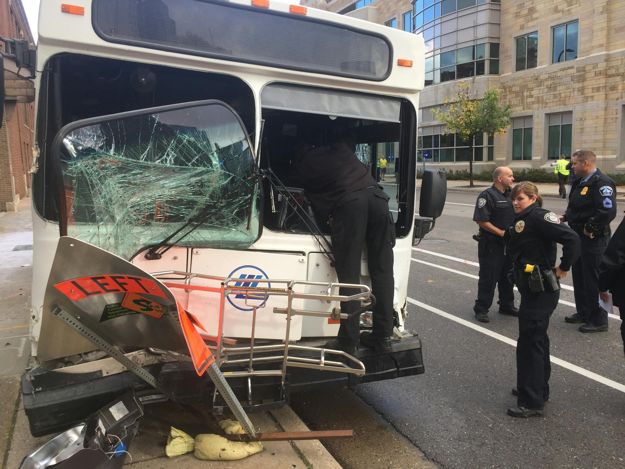 Rescuers respond to a Plymouth Metrolink bus crash in downtown Minneapolis on Wednesday morning.