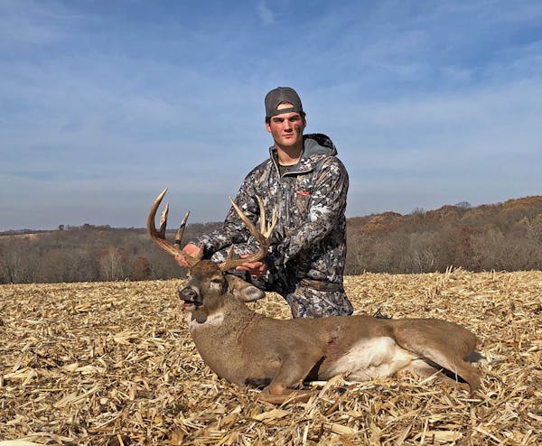 Jake Gonse, 16, of Anoka, felled this monster 12-pointer in Houston County on opening morning. His grandfather, retired Star Tribune outdoors columnis