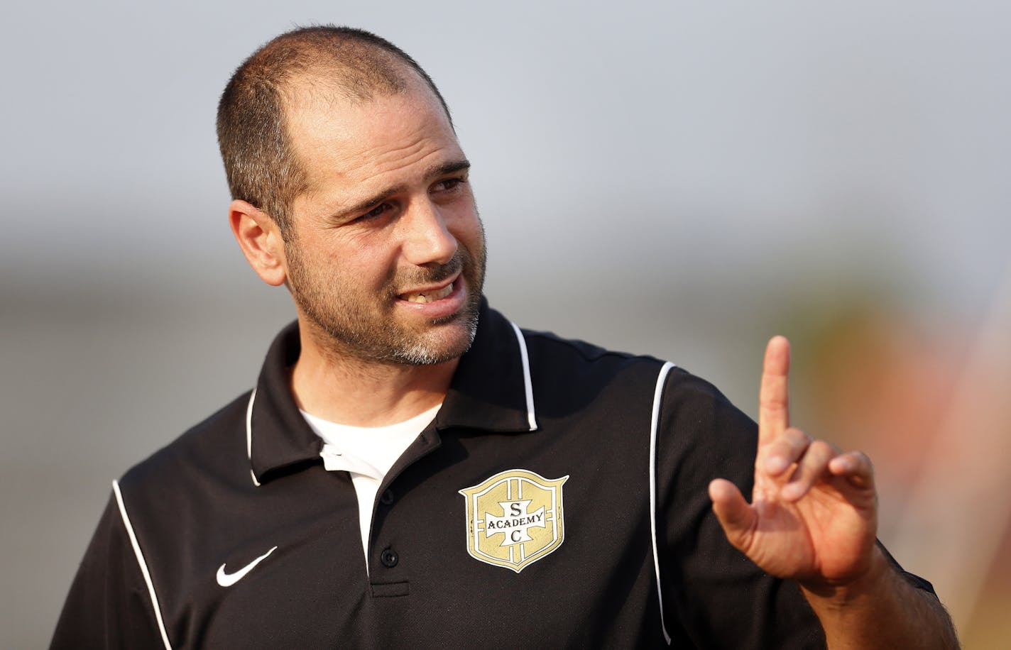 Stillwater high school soccer coach Jake Smothers. ] CARLOS GONZALEZ cgonzalez@startribune.com August 20, 2013, Stillwater, Minn., Stillwater high school prep soccer -