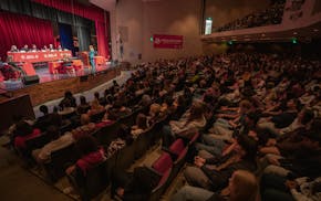 Attornies Mallory Stoll, right, and Elisabeth Johnson argue their case in front of the Minnesota Supreme Court and hundreds of students at Highland Pa