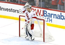 Carolina Hurricanes goaltender Jack LaFontaine (80) reacts after giving up a goal to the New Jersey Devils during the third period of an NHL hockey ga