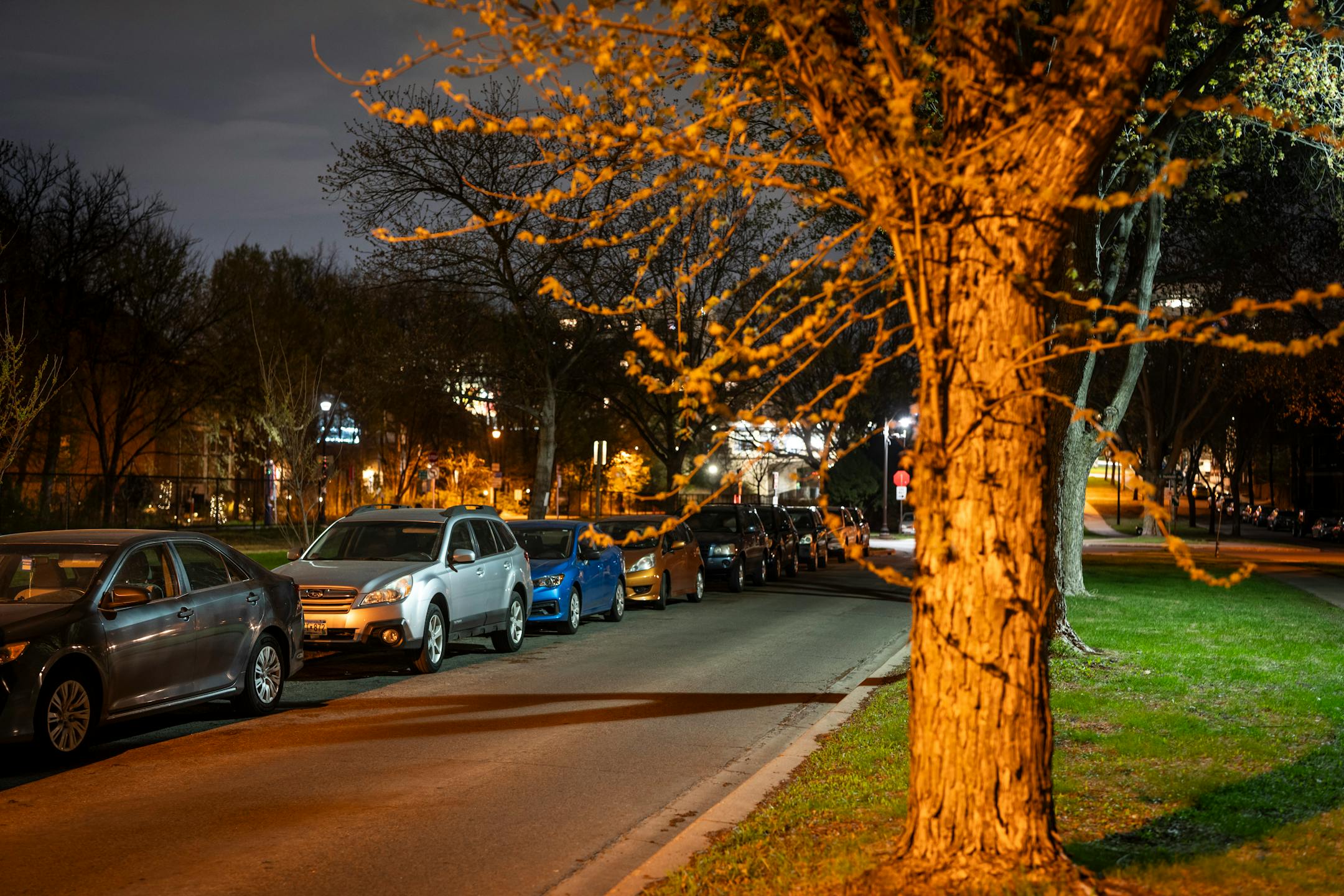 Cars park along The Mall at night in Minneapolis on April 30.