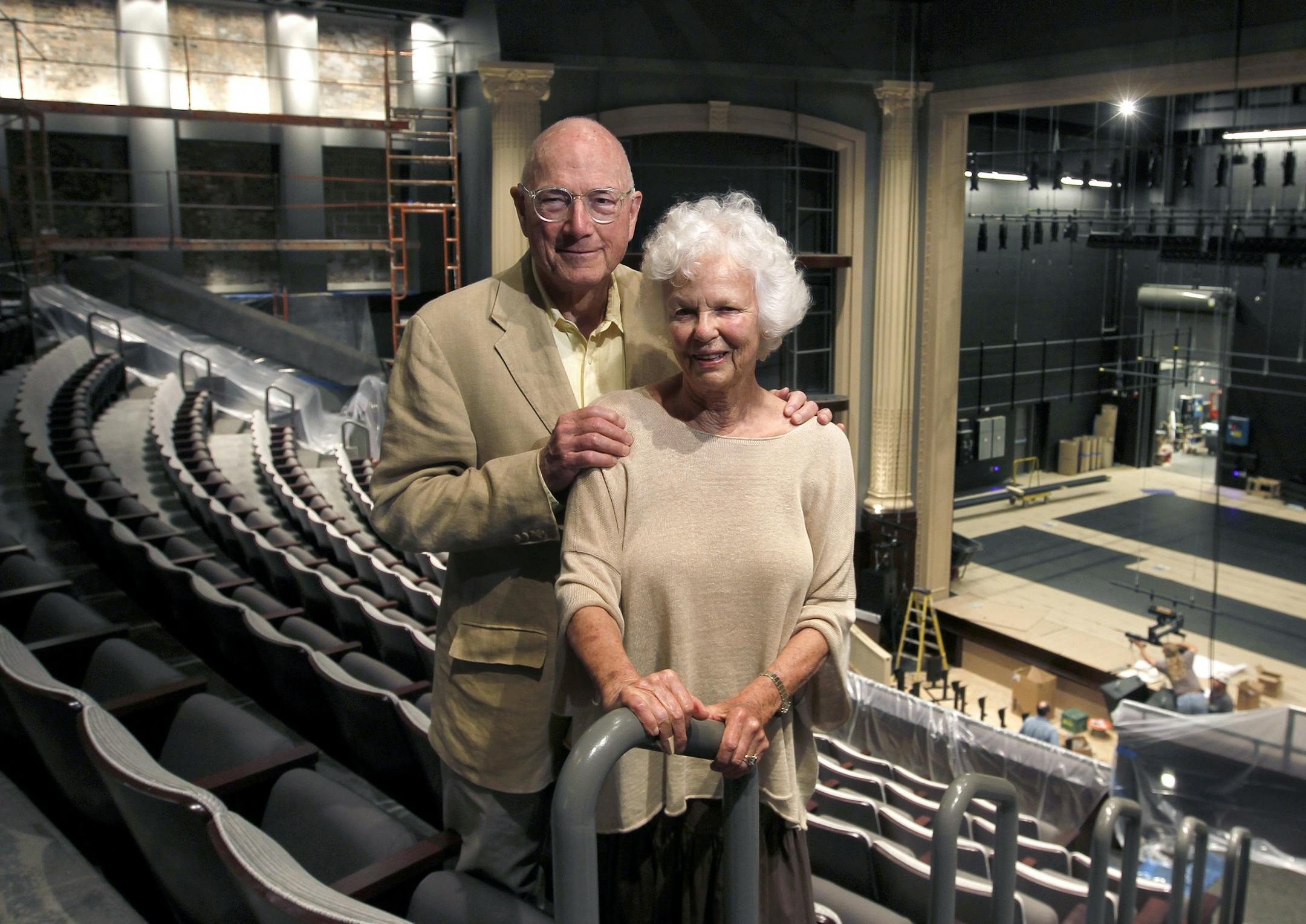 In this Aug. 25, 2011, photo, John Cowles Jr. and Sage Cowles pose for a photo at the Minnesota Shubert Center in Minneapolis. Cowles, a former publisher and chairman of the Star Tribune newspapers and a philanthropist who helped shape the cultural community of the Twin Cities by pushing for facilities like the Guthrie Theater and the Metrodome, has died. He was 82. (AP Photo/The Star Tribune, Tom Wallace) MANDATORY CREDIT; ST. PAUL PIONEER PRESS OUT; MAGS OUT; TWIN CITIES TV OUT