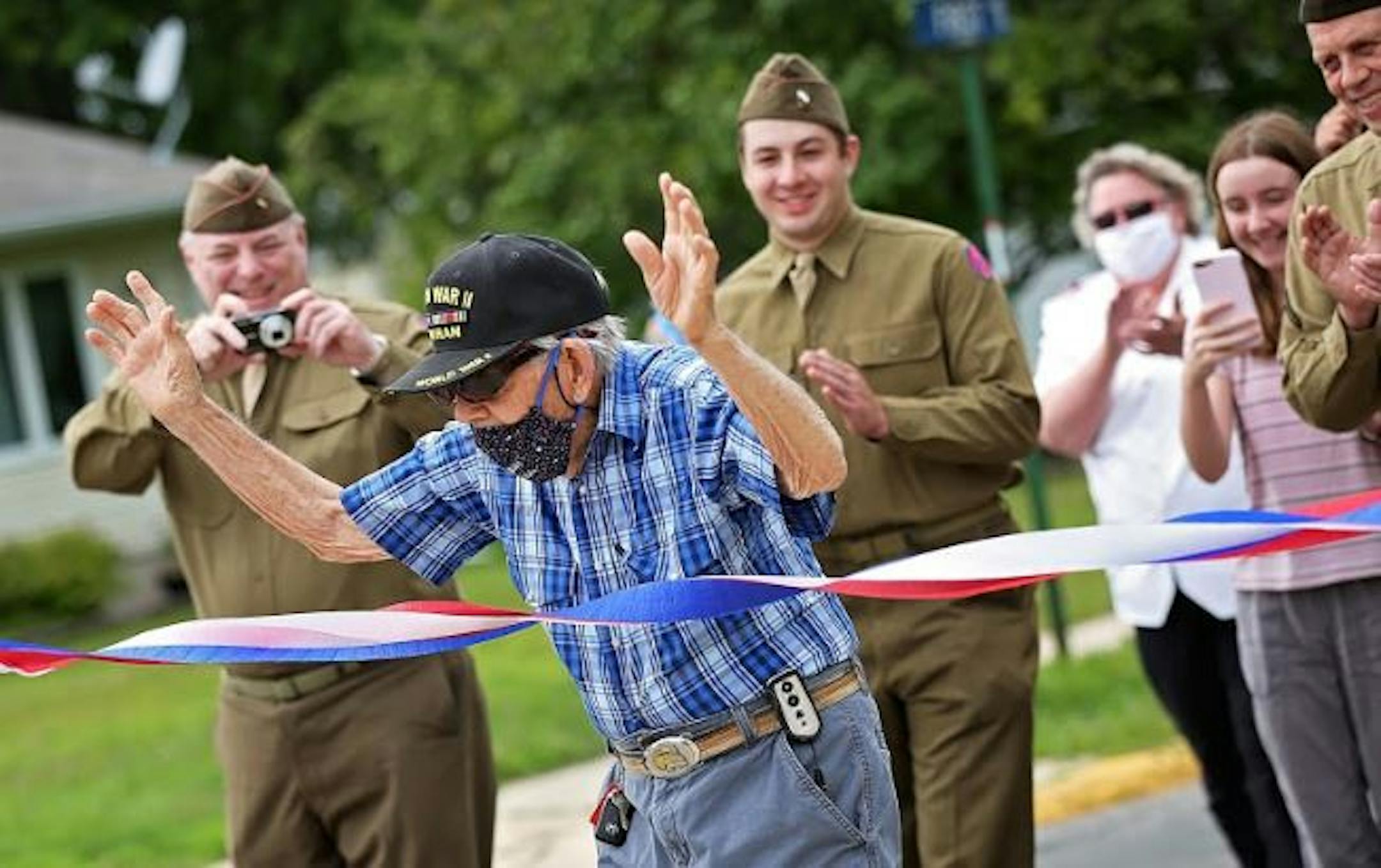 World War II veteran Mickey Nelson completed his summertime goal of walking 100 miles.