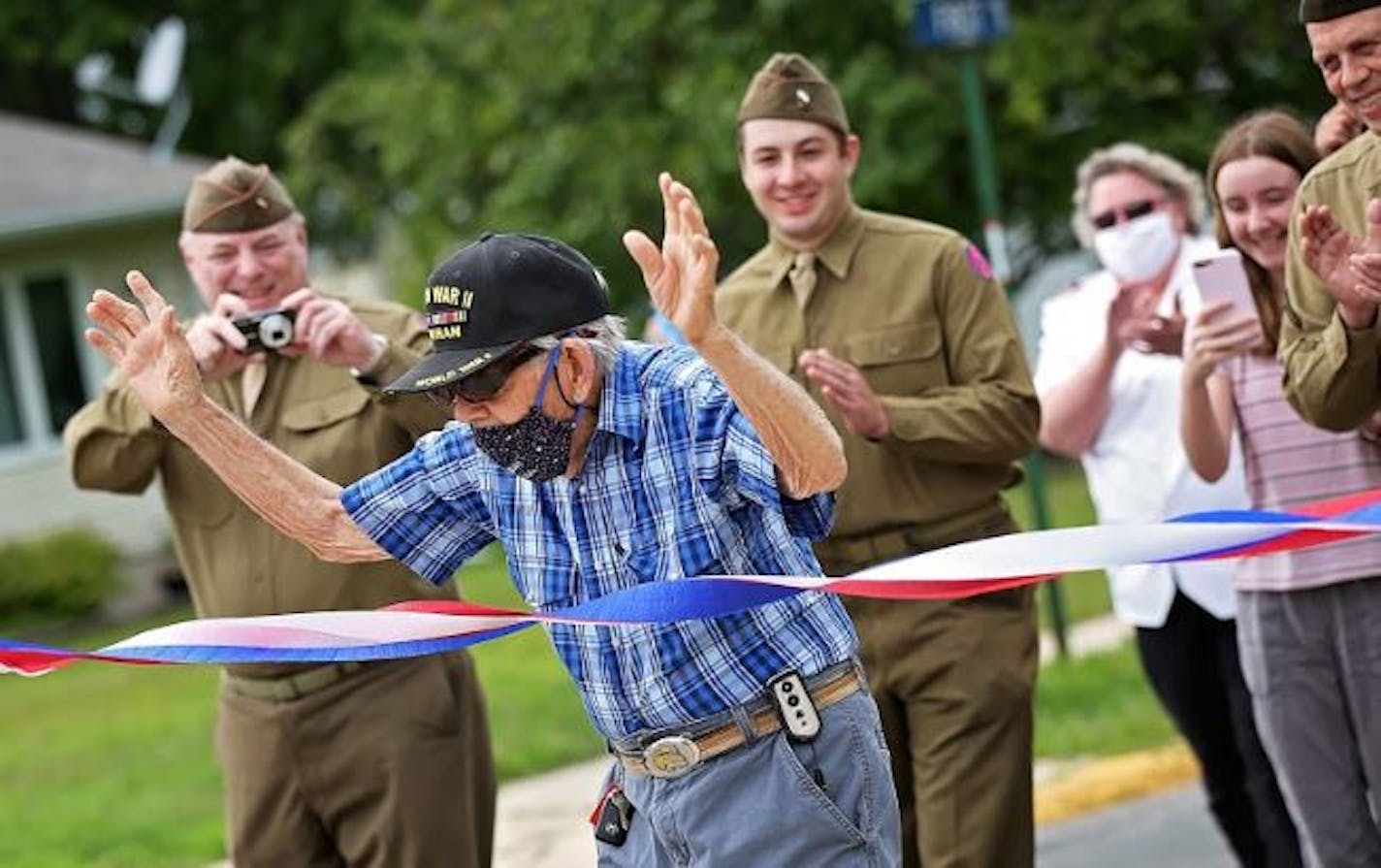 World War II veteran Mickey Nelson completed his summertime goal of walking 100 miles.