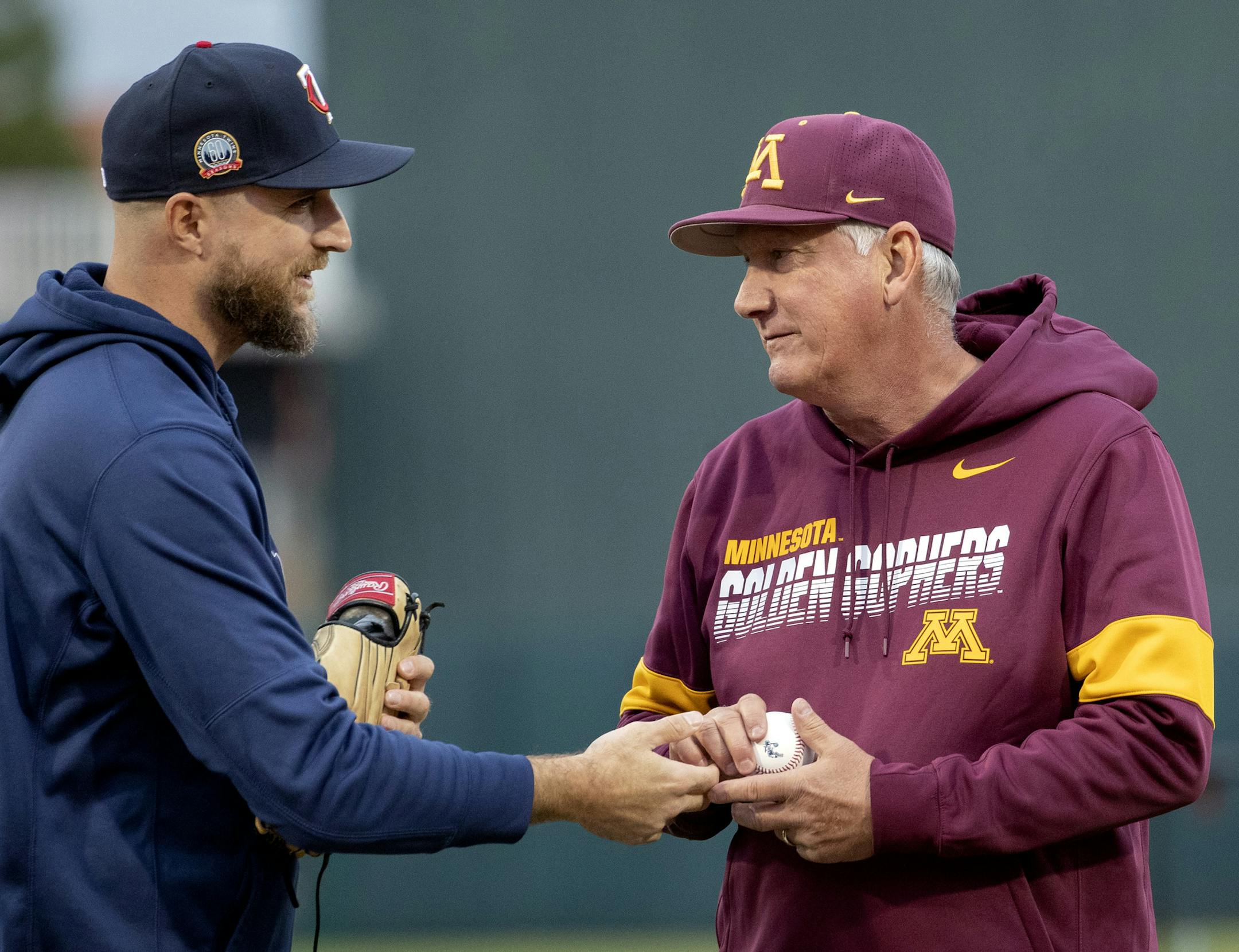 Minnesota Twins manager Rocco Baldelli spoke with Gophers head coach John Anderson after he threw the first pitch. ] CARLOS GONZALEZ • cgonzalez@startribune.com – Fort Myers, FL – February 21, 2020, CenturyLink Sports Complex, Hammond Stadium, Minnesota Twins, Spring Training vs. University of Minnesota Golden Gophers