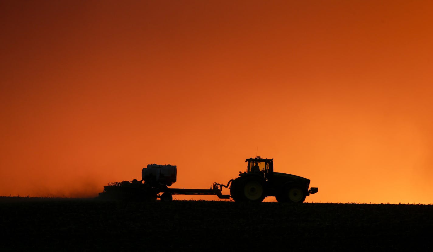 Corn planting around the U.S. this spring suggests a record crop is going in despite slumping demand and ultralow prices.