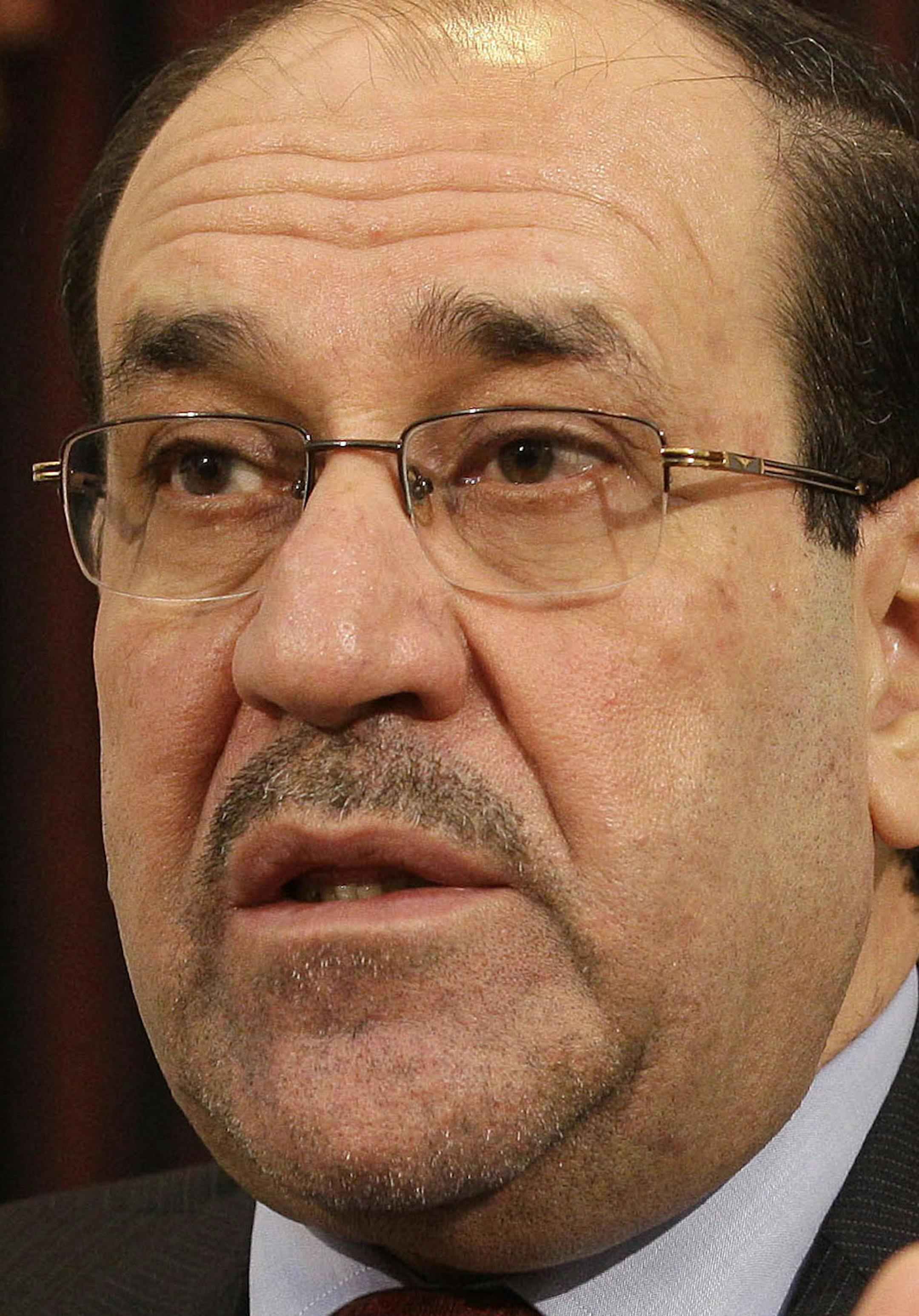 File -- In this Saturday, Dec. 3, 2011 file photo, Iraq's Shiite Prime Minister Nouri al-Maliki is seen during an interview with The Associated Press in Baghdad, Iraq. In results announced Monday, May 19, 2014, State of Law, a coalition led by Al-Maliki has emerged as the biggest winner in the countryís April 30 parliamentary elections. Al-Maliki must now reach out to other blocs to try to cobble together a ruling coalition. That process could take months. (AP Photo/Hadi Mizban, File)
