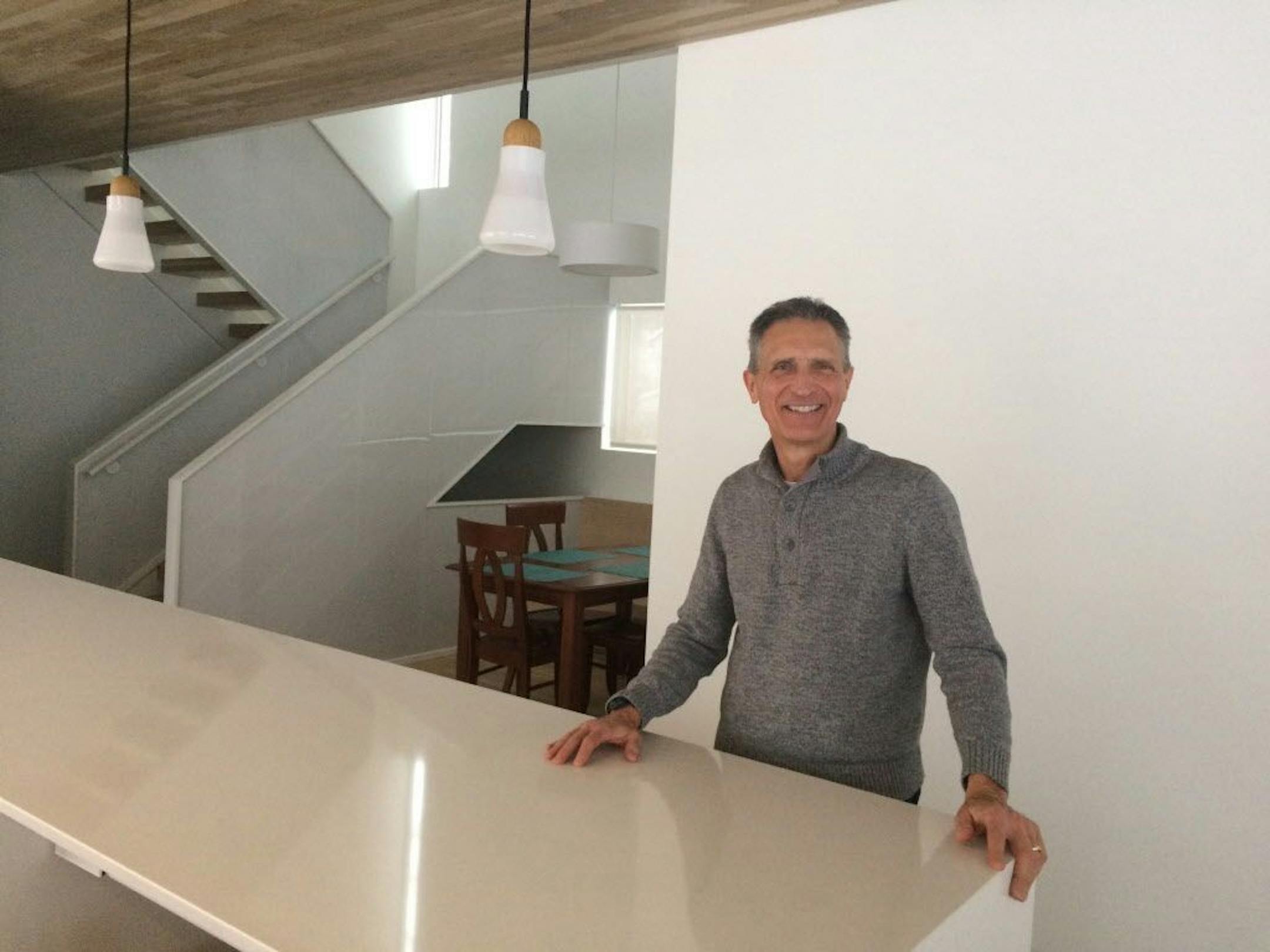 Homeowner Pete Steinhagen at the kitchen island.