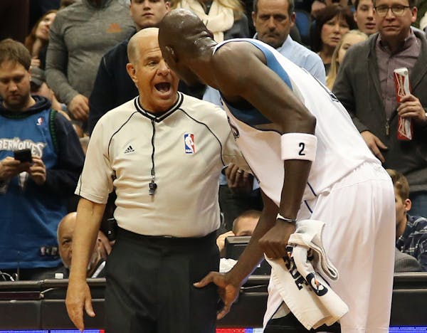 Wolves Kevin Garnett argued with referee Bennett Salvatore after receiving his second technical of the game and he was ejected.