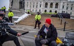 Robert Marvin, a Trump supporter peacefully protested on the steps of the Minnesota State Capitol.There was heavy security at the State Capitol in cas
