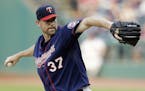 Minnesota Twins starting pitcher Mike Pelfrey delivers in the first inning of a baseball game against the Cleveland Indians, Friday, May 8, 2015, in C
