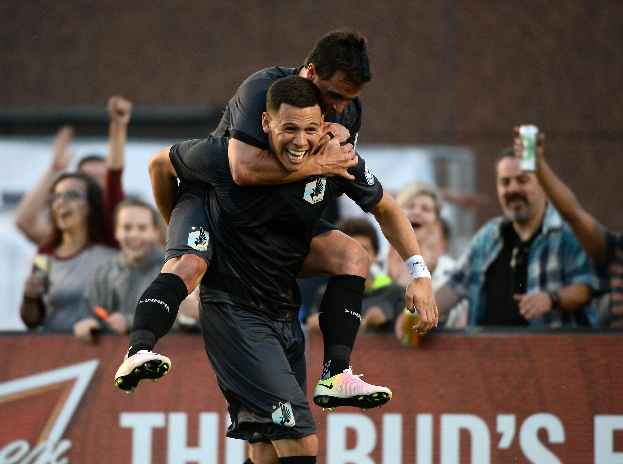 Minnesota United FC forward Danny Cruz (8) took a ride on the back of forward Christian Ramirez (21) after Ramirez scored a goal against the Fort Lauderdale Strikers in the first half Saturday.