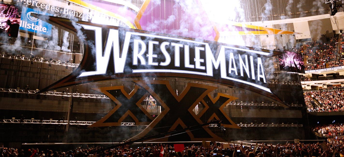 Fireworks are seen on the main stage as Wrestlemania XXX begins at the Mercedes-Benz Super Dome in New Orleans on Sunday, April 6, 2014. (Jonathan Bachman/AP Images for WWE)