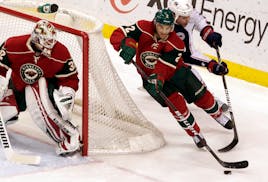 Mike Lundin (2), with the Wild in 2012.