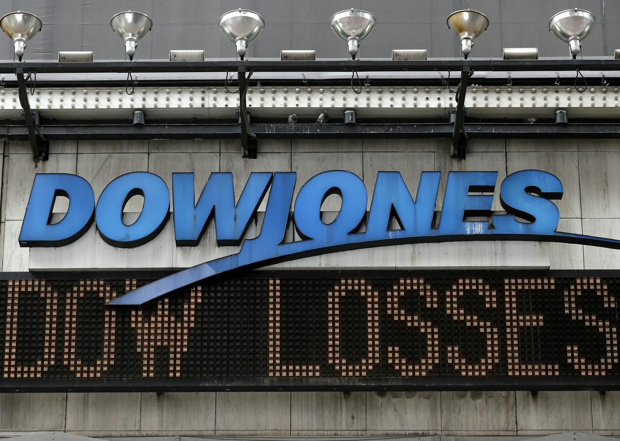 An electronic display shows information about the stock market in Times Square, New York, Monday, Aug. 24, 2015. World stock markets plunged on Monday after China's main index sank 8.5 percent — its biggest drop since the early days of the global financial crisis — amid deepening fears over the health of the world's second-largest economy. (AP Photo/Seth Wenig)