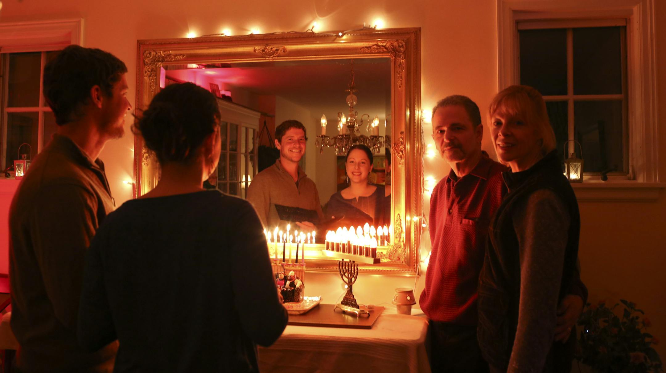 Joseph and Michaela Martel of Minneapolis with the menorahs made for them when they were small children by a family friend who was killed in the Accent Signage shootings last year. They are in the Minneapolis home of their father, Rod Martel and his wife Colleen Anderson Tuesday night, December 17, 2013. ] JEFF WHEELER ‚Ä¢ jeff.wheeler@startribune.com