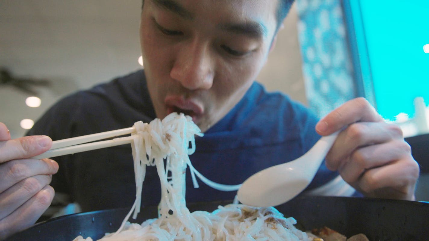 A diner takes the 10-pound pho challenge at iPho by Saigon in St. Paul