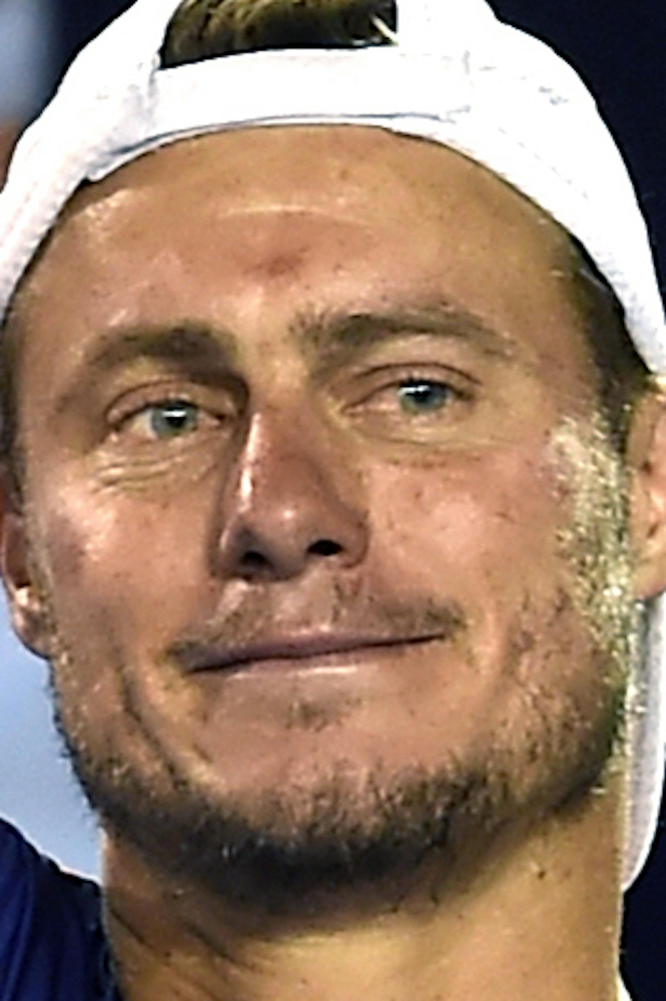 Lleyton Hewitt of Australia waves farewell to the crowd on Rod Laver Arena as he leaves with his children after playing his last singles match as a professional player against David Ferrer of Spain in a second round match at the Australian Open tennis championships in Melbourne, Australia, Thursday, Jan. 21, 2016.(AP Photo/Andrew Brownbill)