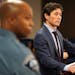 Minneapolis Mayor Jacob Frey, standing a distance from Police Chief Medaria Arradondo, at a news conference in March.