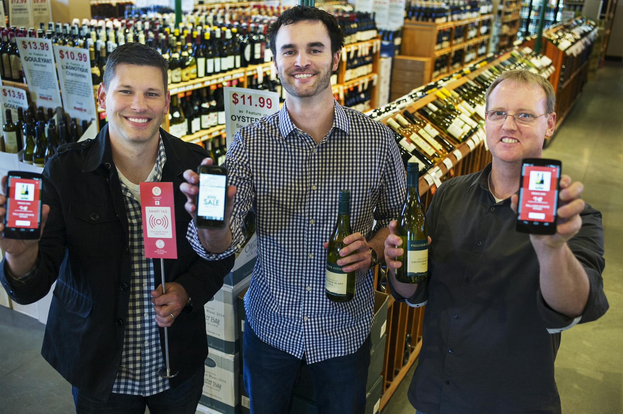 At France 44 liquor store, Opnia creative director Brandon Johnson, digital strategist and ad operations Brett Loney, and development lead Brook Oldre have created an app that pushes digital content such as items on sale directly to a customer's phone.] Richard Tsong-Taatarii/rtsong-taatarii@startribune.com