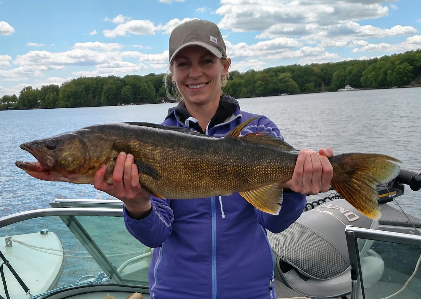 Kristin Viger, of Excelsior, caught this 31-inch walleye while anchored on Lake Minnetonka. Viger landed the 9-pound, 2-ounce fish using bobbers and worms on a 4-pound test line.