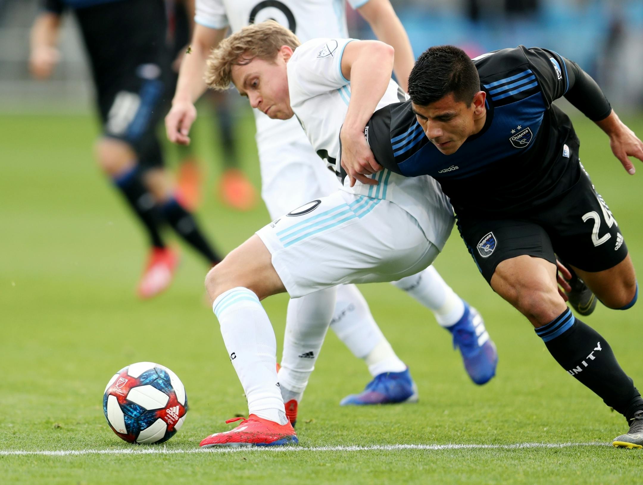 SAN JOSE, CALIFORNIA - MARCH 9: Minnesota United's Rasmus Schuller (20) and San Jose Earthquakes' Nick Lima (24) battle for the ball during the first half of a MLB game at Avaya Stadium in San Jose, Calif., on Saturday, March 9, 2019.