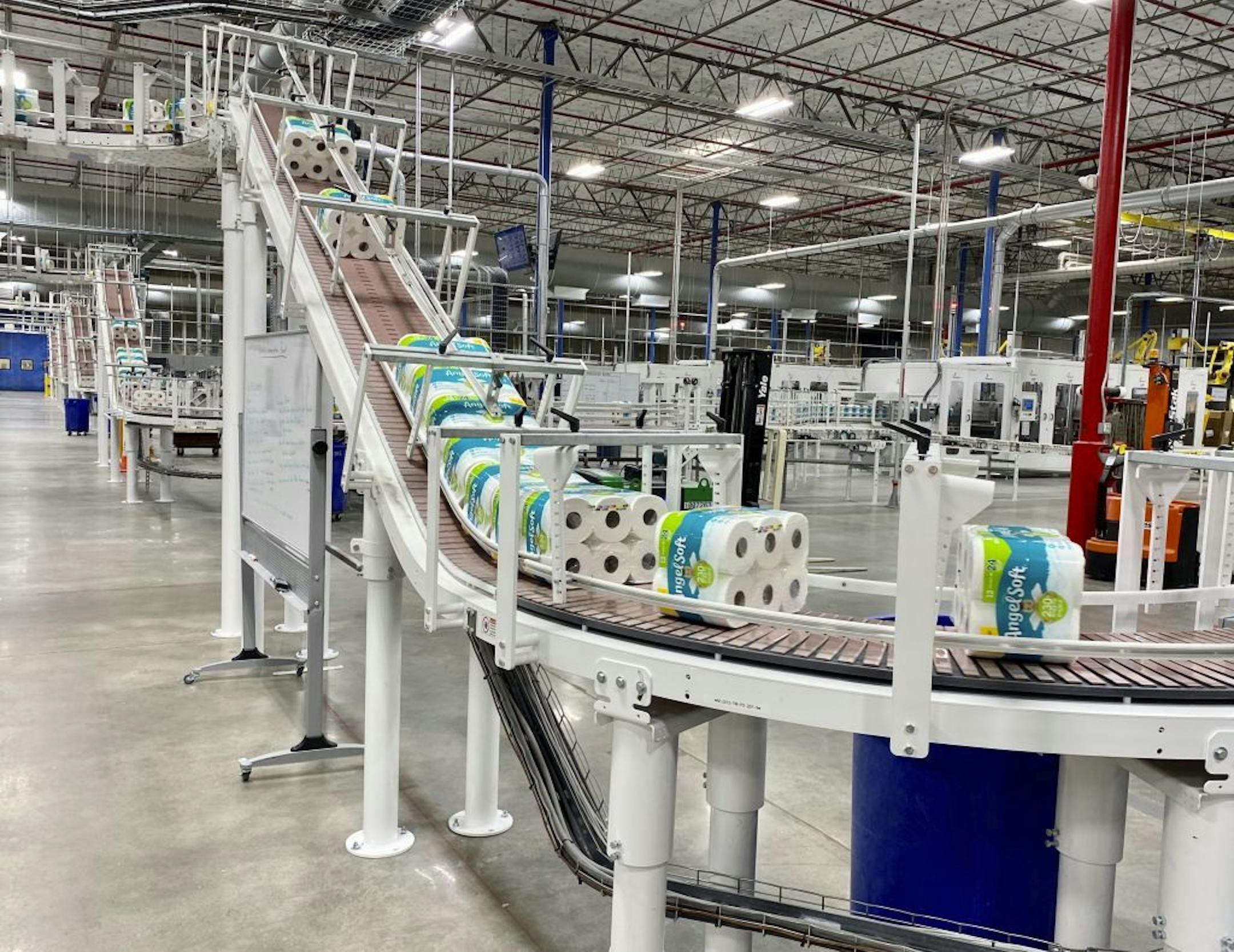 This undated photo provided by Georgia-Pacific shows the production line at the Georgia-Pacific plant in Atlanta. NCSolutions, a data and consulting firm, said online and in-store U.S. toilet paper sales rose 51% between Feb. 24, 2020 and March 10, as buyers started getting uneasy about the growing number of coronavirus cases.