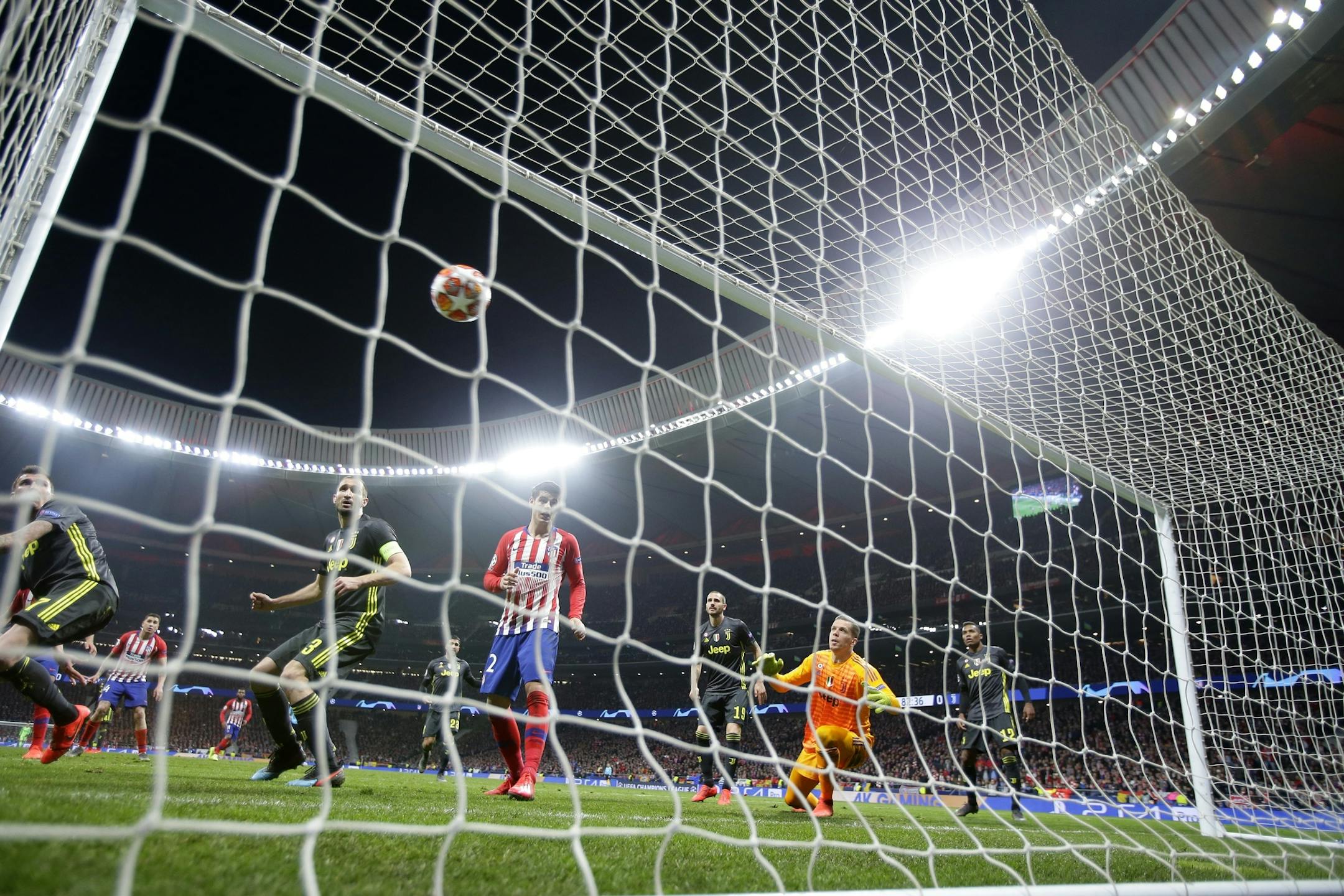 Atletico Jose Gimenez scores his side's opening goal during the Champions League round of 16 first leg soccer match between Atletico Madrid and Juventus on Wednesday at Wanda Metropolitano stadium in Madrid. Atletico won 2-0.