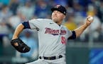 Minnesota Twins relief pitcher Caleb Thielbar throws during the sixth inning of a baseball game against the Kansas City Royals Saturday, Oct. 2, 2021,
