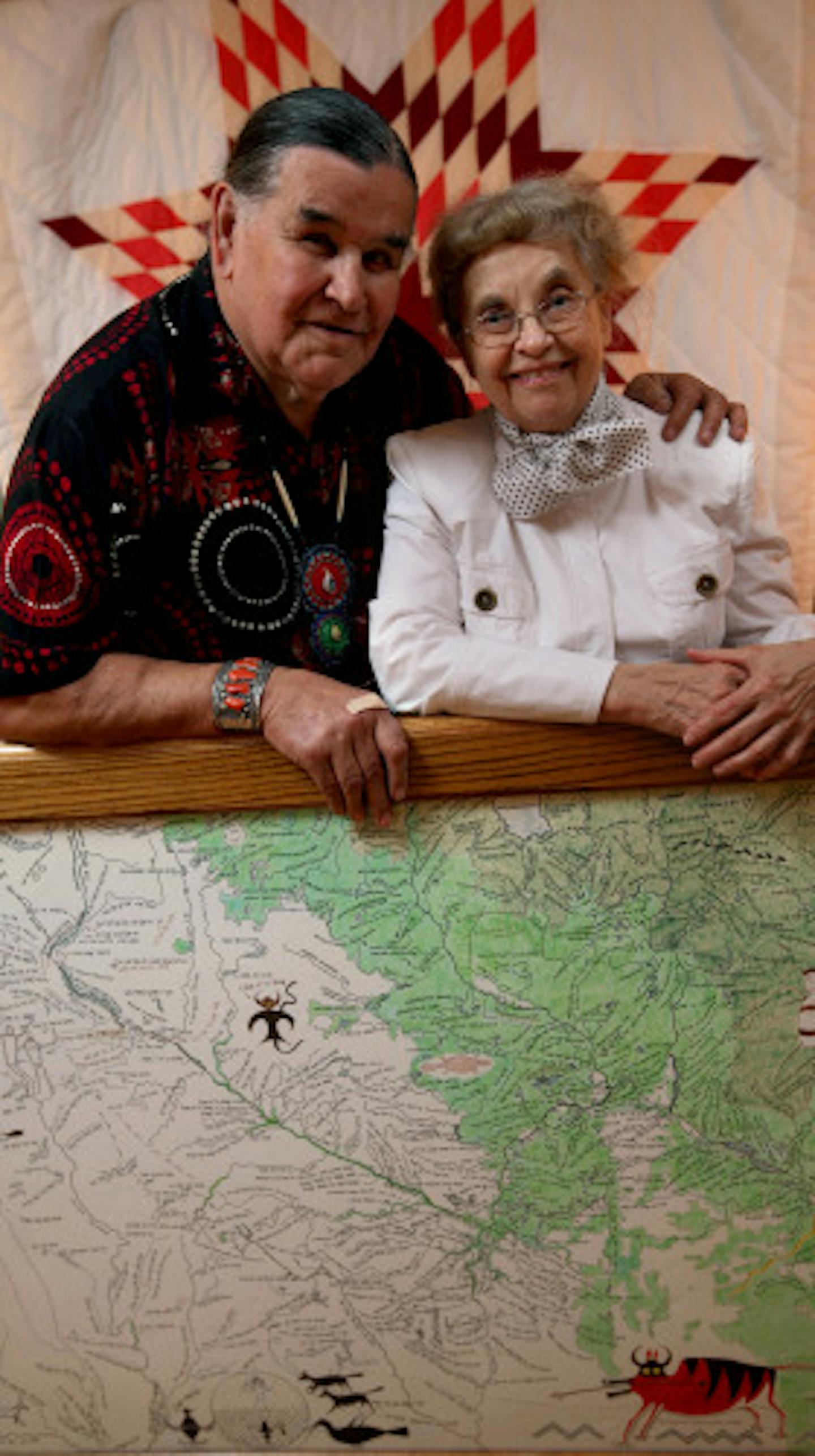 Paul Durand's widow, Dorothy, and Indian activist Clyde Bellecourt posed with Durand's map depicting Indian place-names in the area.