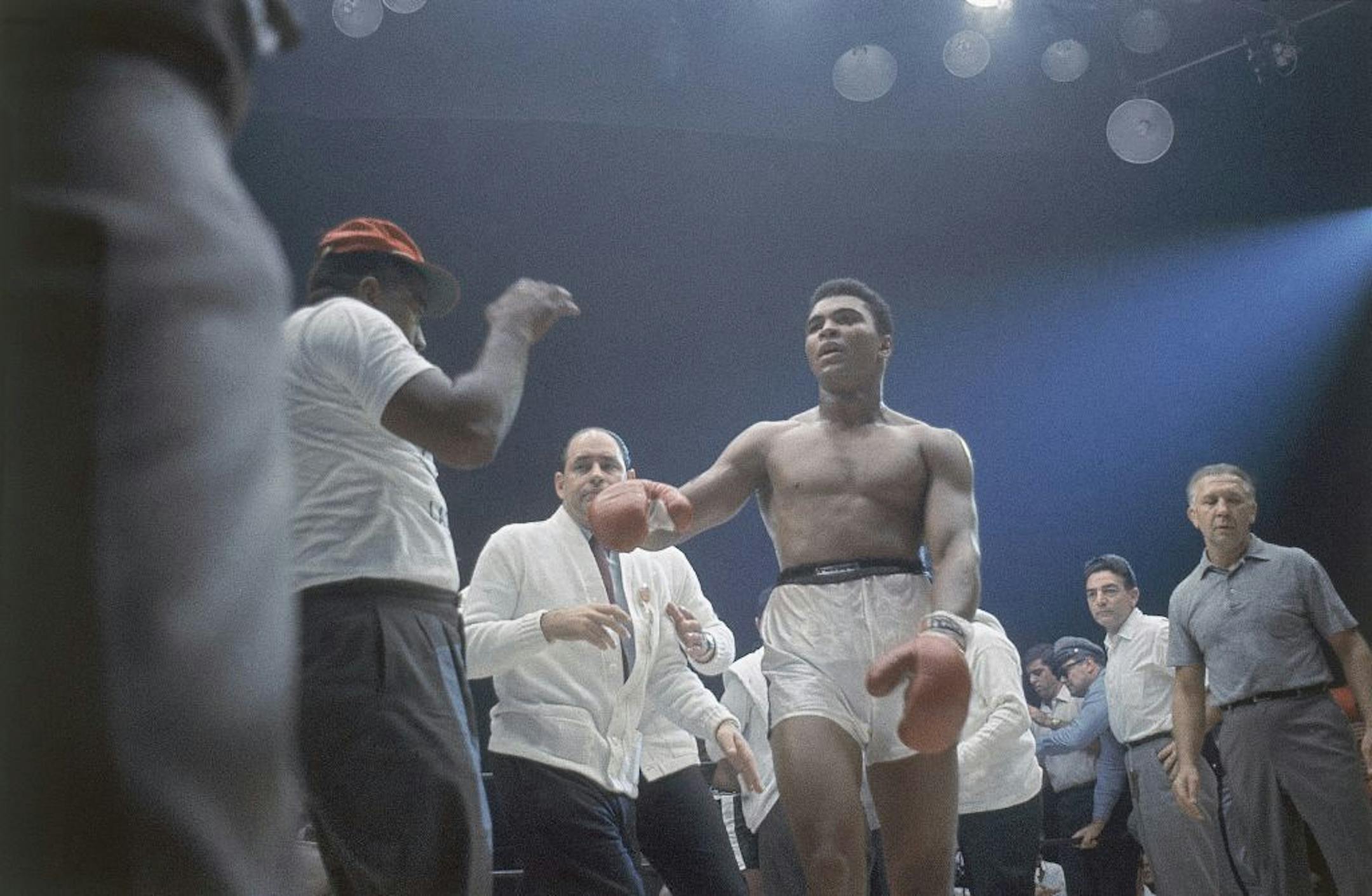 Muhammad Ali, or Cassius Clay, as he was known at the time, is shown during the heavyweight title fightagainst Sonny Liston in Miami Beach, Fla., Feb. 25, 1964.The bout lasted only one minute into the first round. (AP Photo) ORG XMIT: APHS142744