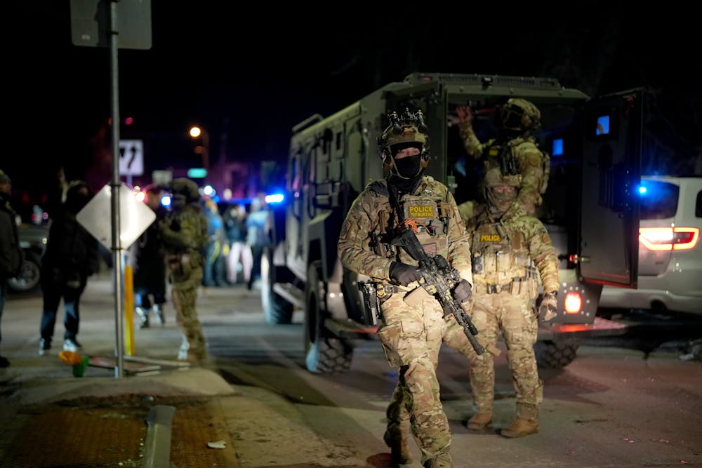 ICE agents on scene of an alleged shooting by federal agents in Minneapolis on Wednesday January 14.