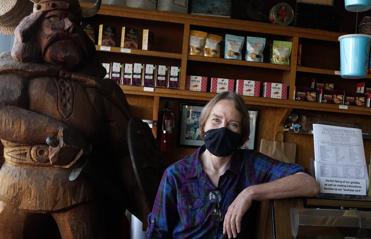 Julie Ingebretsen, owner of Ingebretsen's Scandinavian Gifts & Foods on E. Lake Street, stood for a portrait Friday morning. ] ANTHONY SOUFFLE • anthony.souffle@startribune.com Julie Ingebretsen, owner of Ingebretsen's Scandinavian Gifts & Foods on E. Lake Street, and Elias Usso, owner of Seward Pharmacy, which sustained $500,000 in looting and fire damage, stood for portraits at their respective businesses Friday, Aug. 21, 2020 in south Minneapolis.