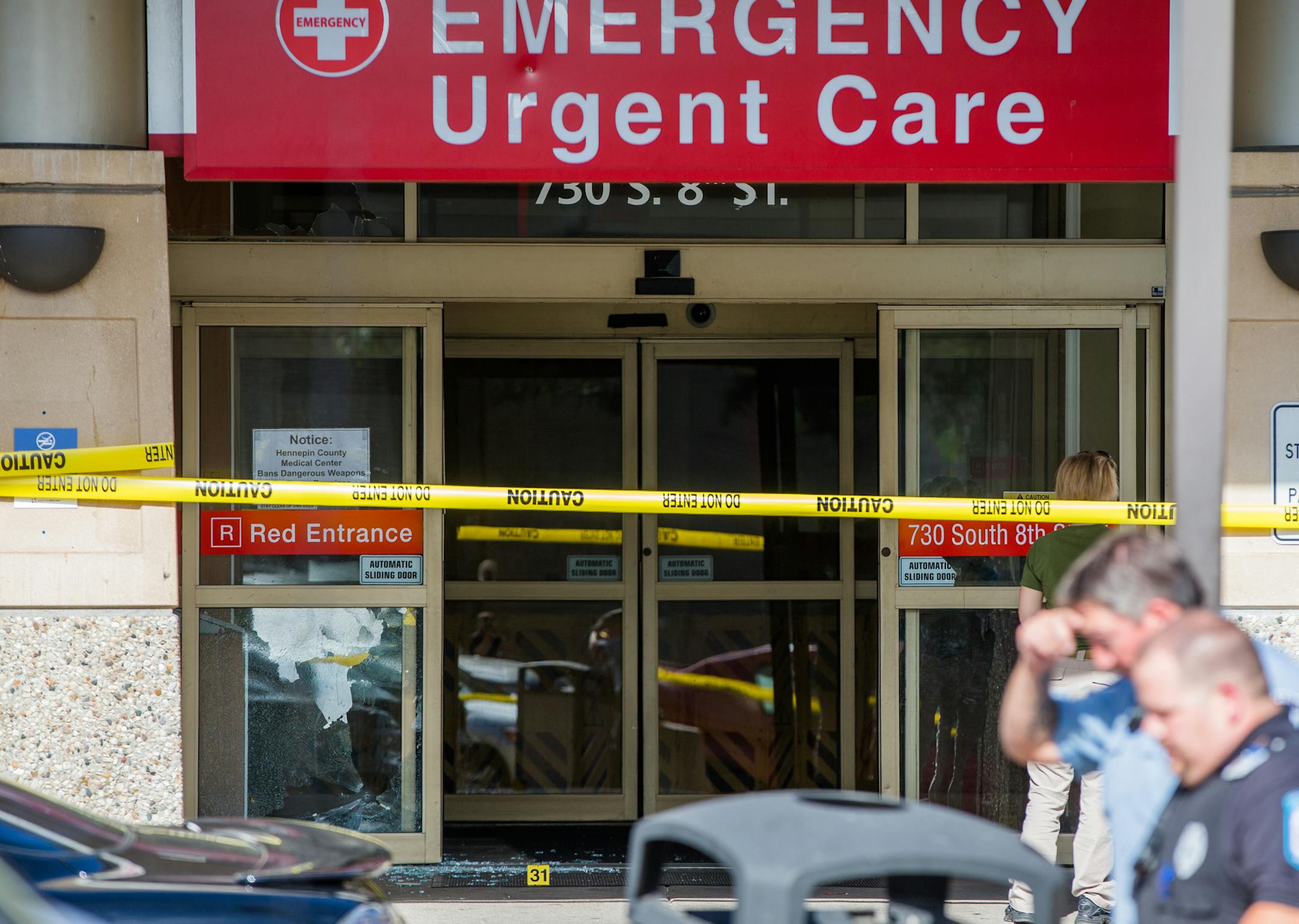 Police tape cordoned off the emergency room entrance on Tuesday after the shots.