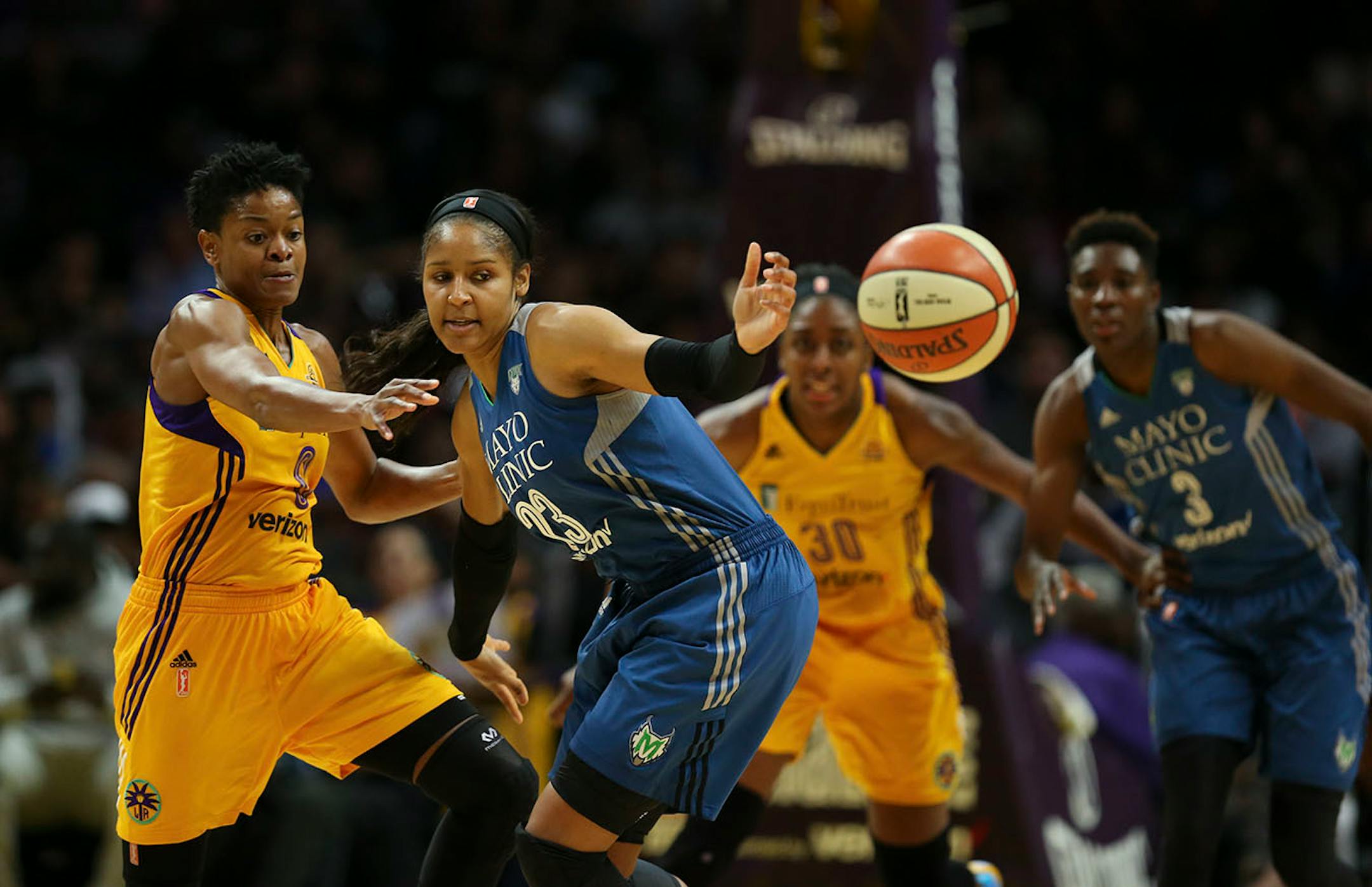 Minnesota Lynx forward Maya Moore (23) eyed a loose ball knocked away by Los Angeles Sparks guard Alana Beard (0) in the fourth quarter.
