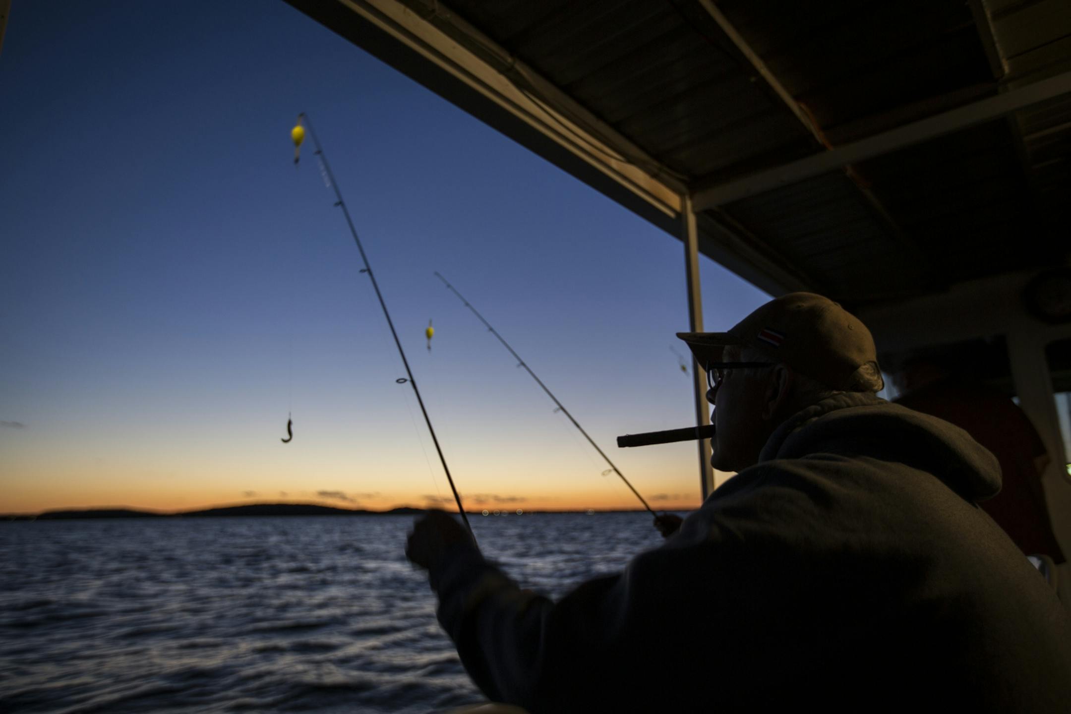 Arnold Biondo of Chicago fishes during a fishing expedition with Twin Pines Resort on Mille Lacs Lake Monday, August 3, 2015.