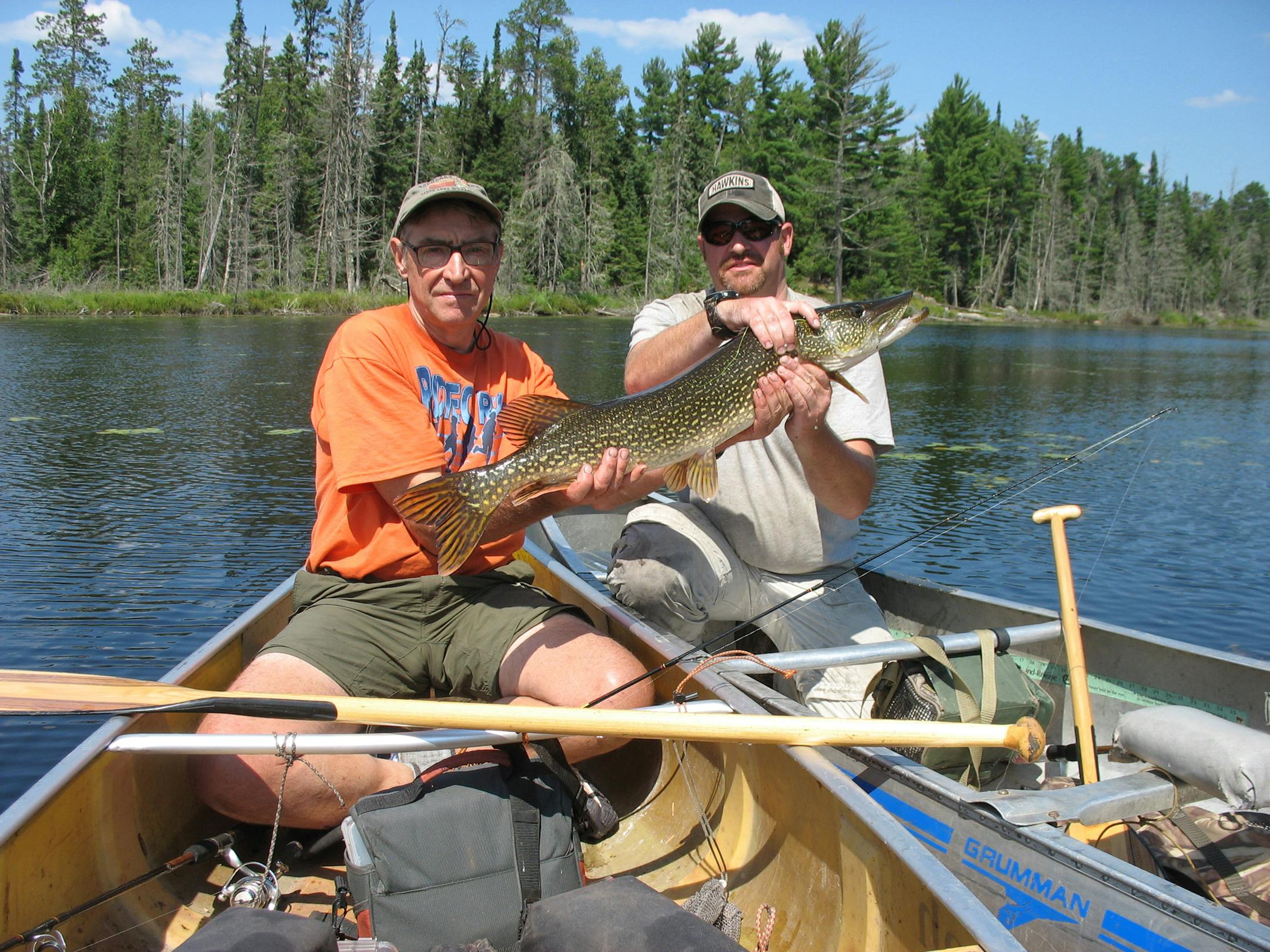 Tom Cherveny, left, counts among his responsibilities at the West Central Tribune, published in Willmar, covering the newspaper's outdoors beat. With him on Angleworm Lake in the BWCA is his son, Erik.