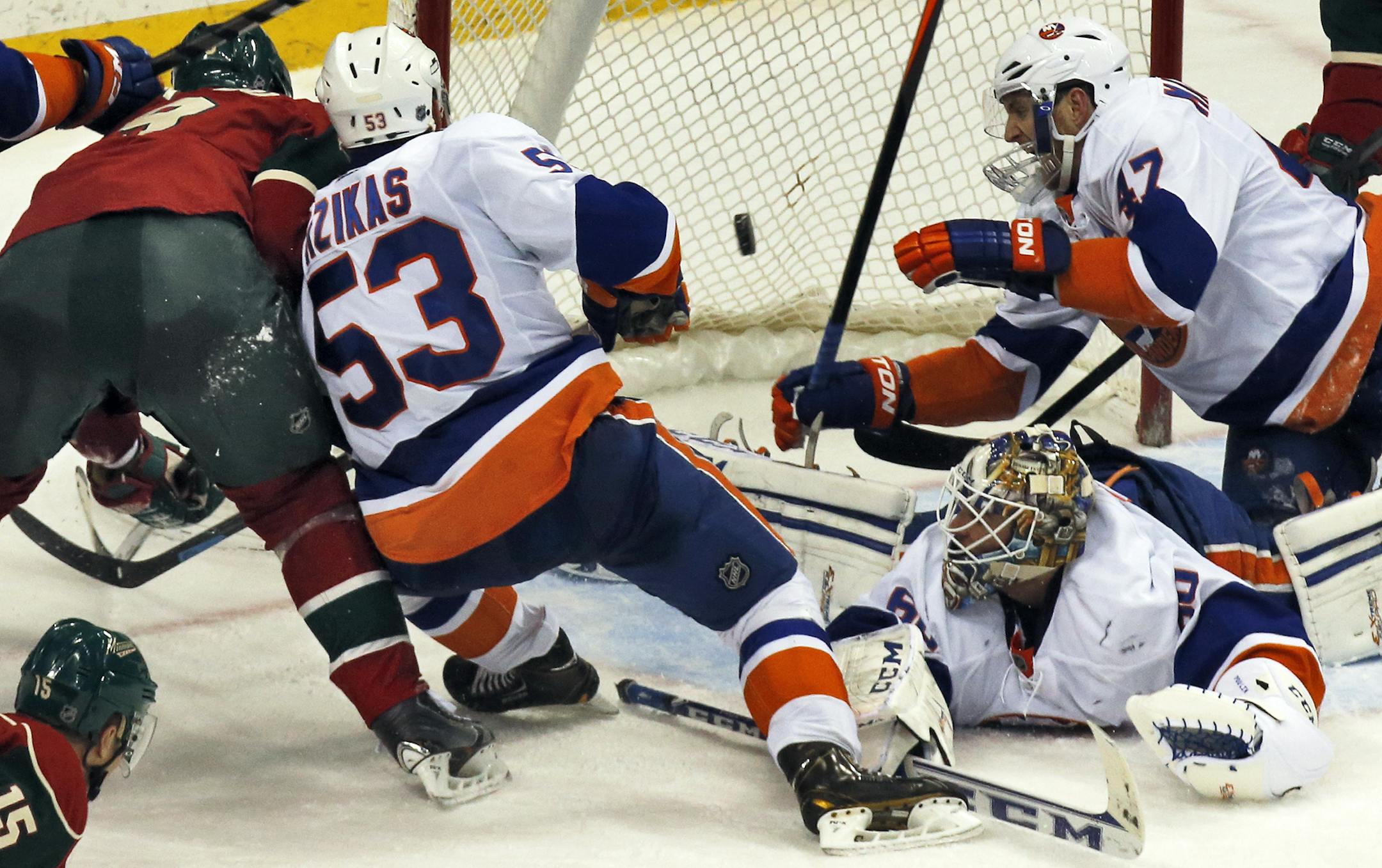 Minnesota Wild vs. New York Islanders. New York won 5-4. Wild Mikko Koivu, left, came close to scoring a goal late in the third period but the puck flew wide of the net. (MARLIN LEVISON/STARTRIBUNE(mlevison@startribune.com)