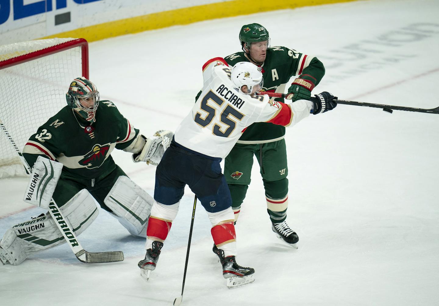 While tangling with Minnesota Wild defenseman Ryan Suter (20) in front of Wild goaltender Alex Stalock, Florida Panthers center Noel Acciari (55) deflected a shot by teammate Mark Pysyk with less than six seconds left in the game to give the Panthers the win. ] JEFF WHEELER &#x2022; Jeff.Wheeler@startribune.com The Minnesota Wild lost to the Florida Panthers 5-4 in an NHL hockey game&#xa0;Monday, January 20, 2020&#xa0;at Xcel Energy Center in St. Paul.