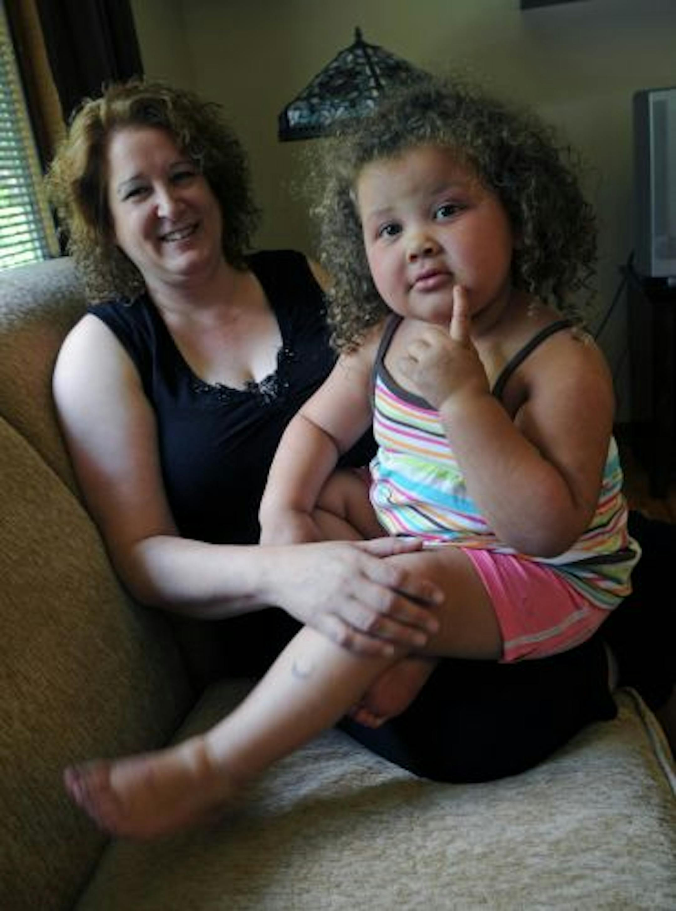 Blaine, Mn. 7/8/10 Melissa Becker and her daughter LaMya Becker, age 3. LaMya was originally Melissa's foster child, and now she's trying to adopt her. Melissa believes that she was discriminated against by Anoka County because they didn't want her as a white woman to be adopting a black child.