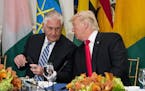 FILE -- President Donald Trump talks with Secretary of State Rex Tillerson at the Palace Hotel in New York, Sept. 20, 2017.