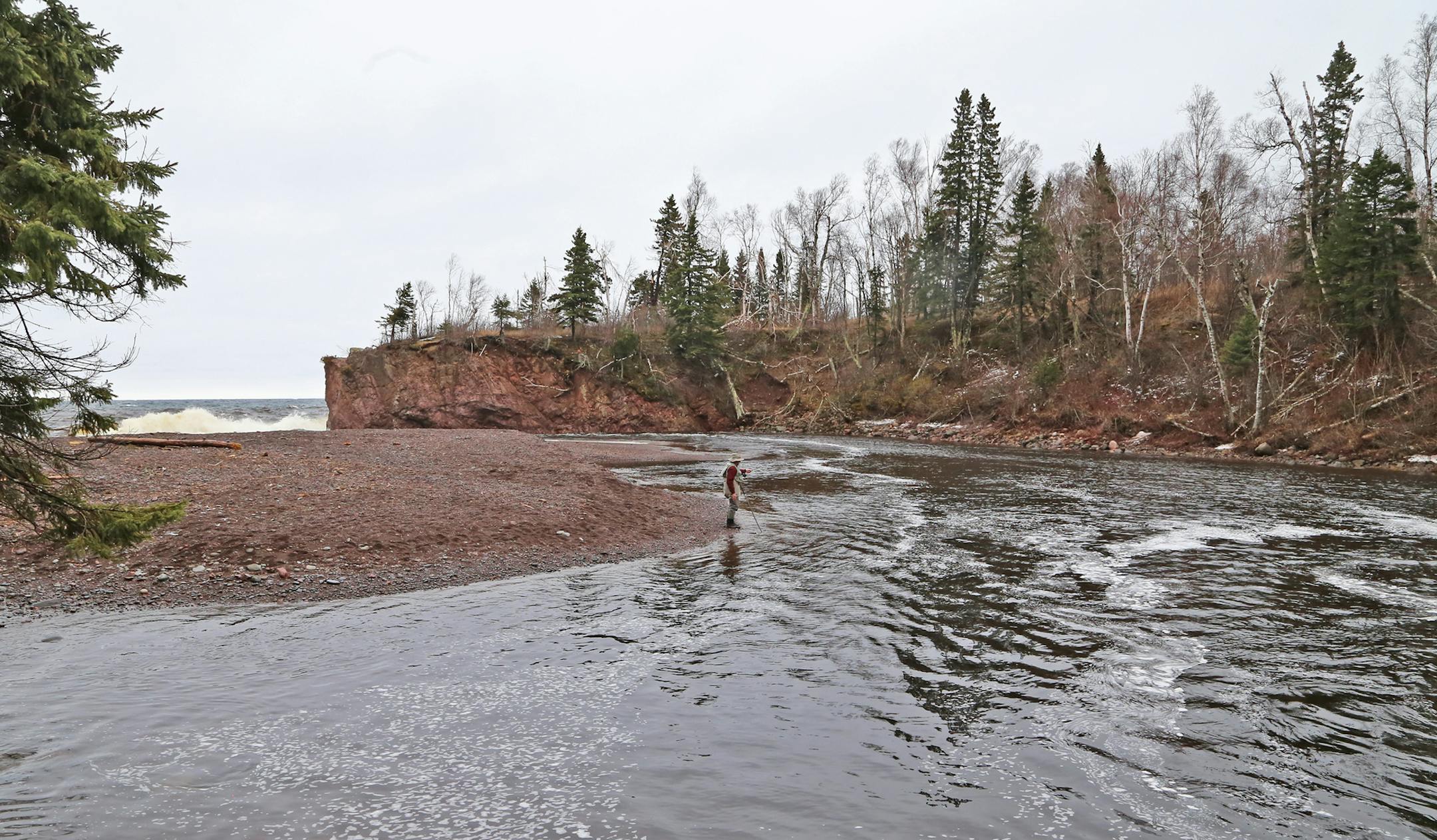 On a spring day on which Lake Superior waves relentlessly pounded Minnesota's North Shore, Dave Zentner of Duluth cut a solitary figure while fishing for steelhead.