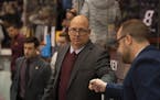 University of Minnesota men's hockey head coach Bob Motzko fist bumped an assistant after the 4-1 win over St. Cloud State, his former team. ] JEFF WH